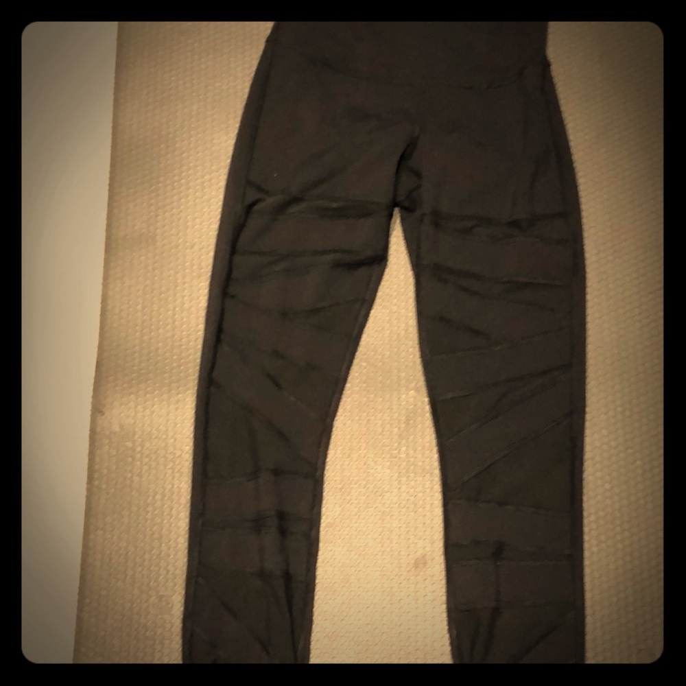 Lululemon black pants with sheer front size 4